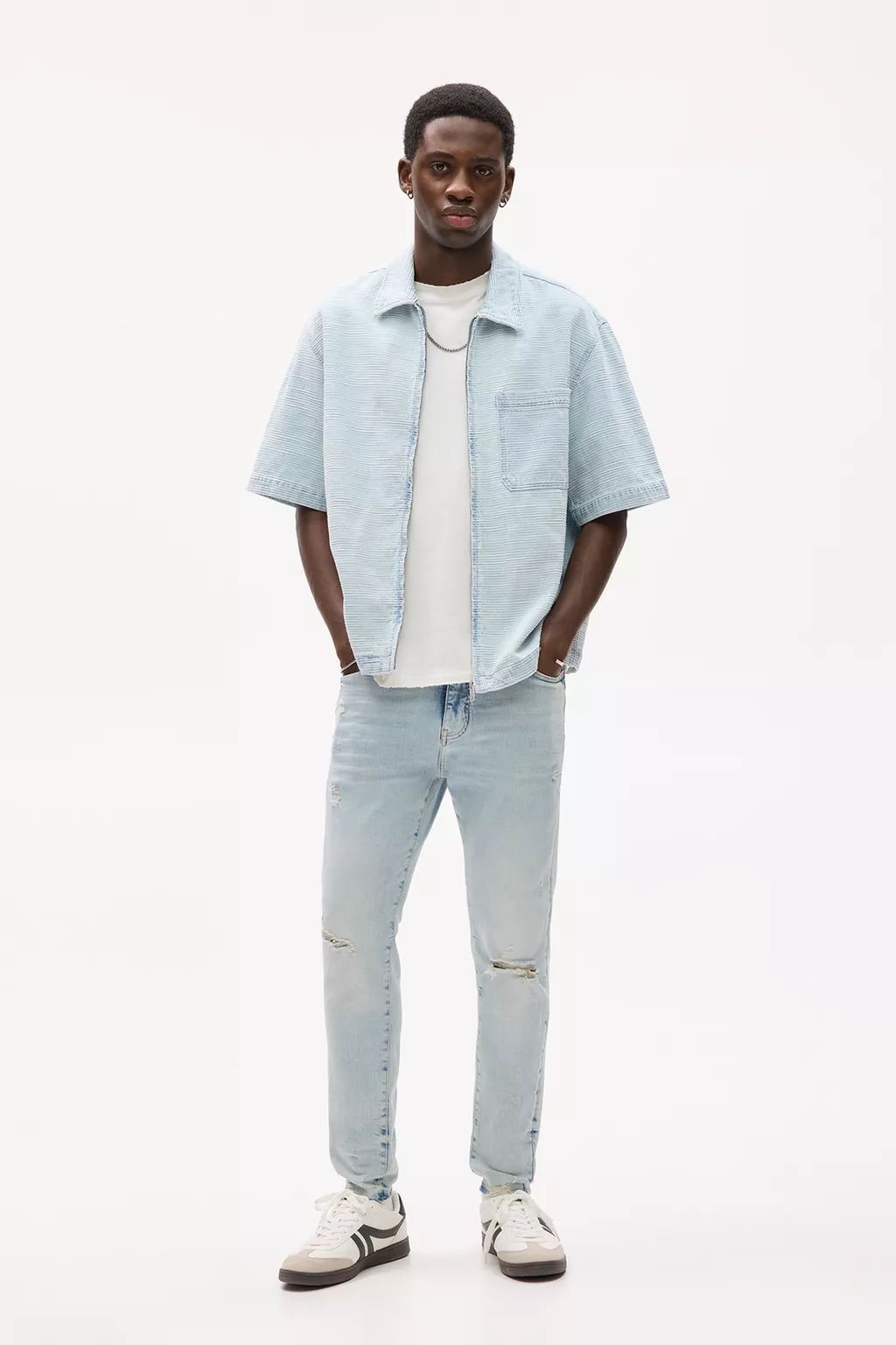 Calças Jeans Com Rasgões